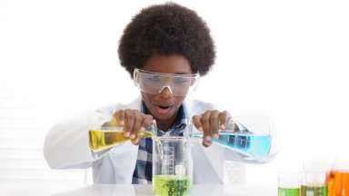 a young scientist mixing a fun concoction