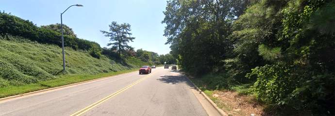 A view of Wade Avenue right after Oberlin Road Bridge, looking downtown, images shows need for sidewalk.