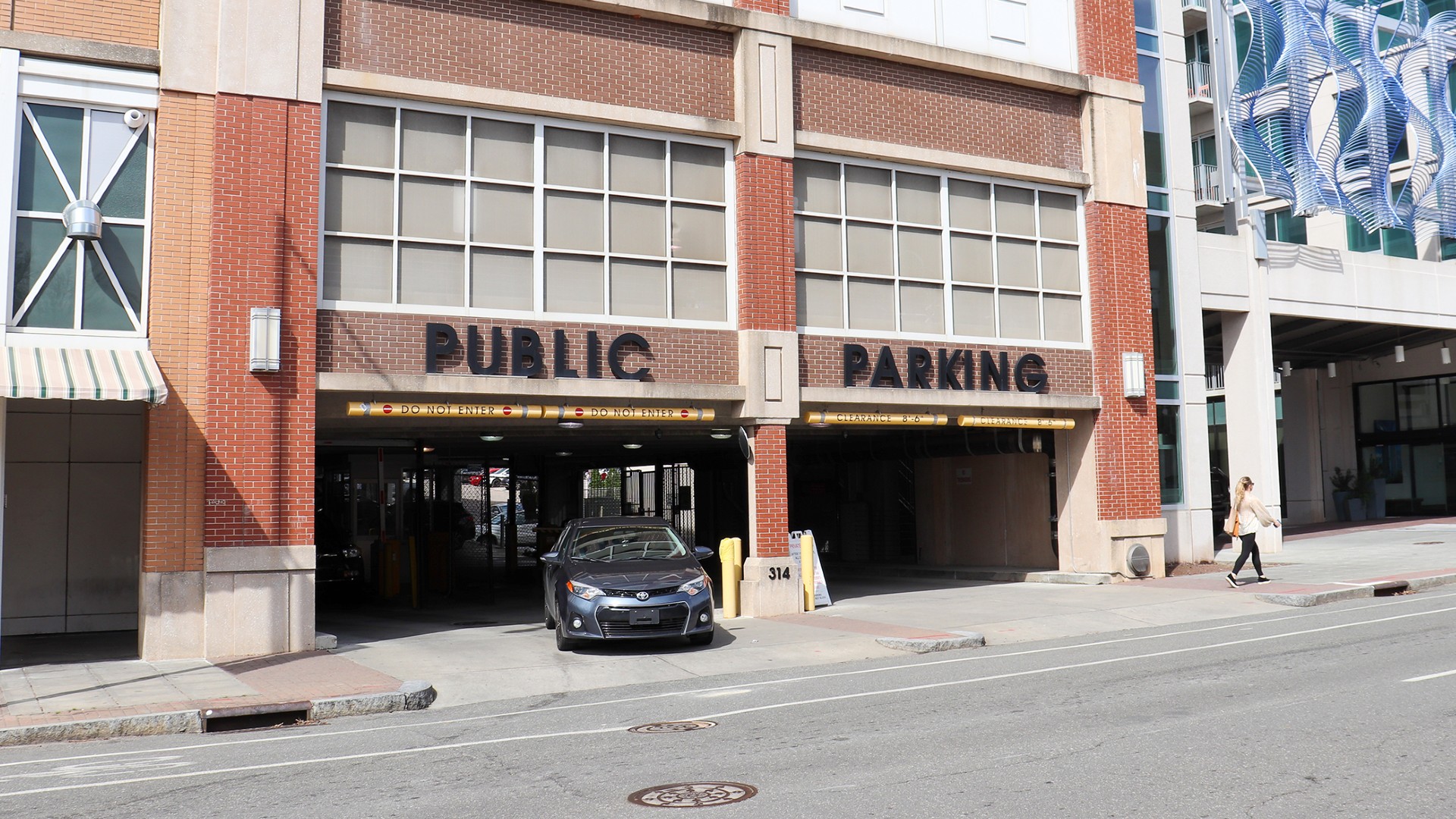 Car leaving the Blount Street Parking deck in Raleigh