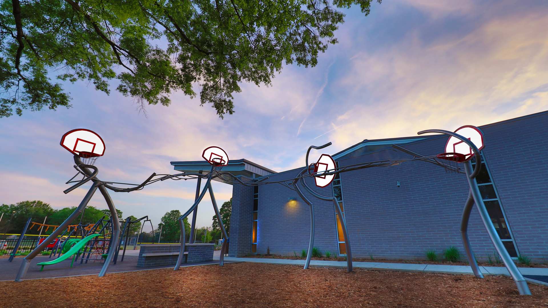 Personified basketball hoop sculptures by artist Chris Fennell. Located at Halifax Park Community Center.