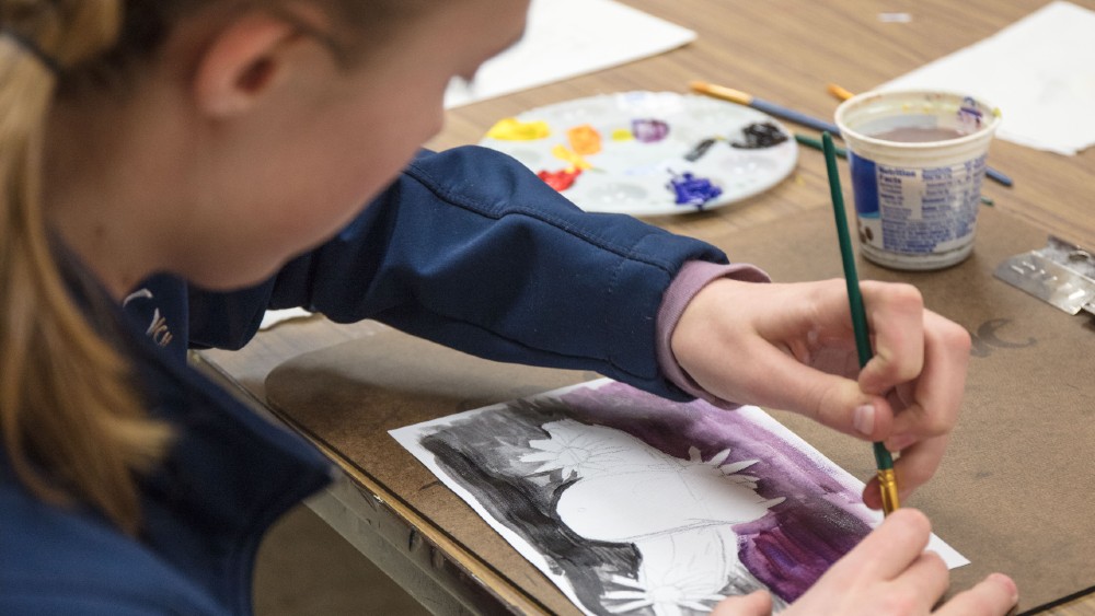 Youth girl painting picture 