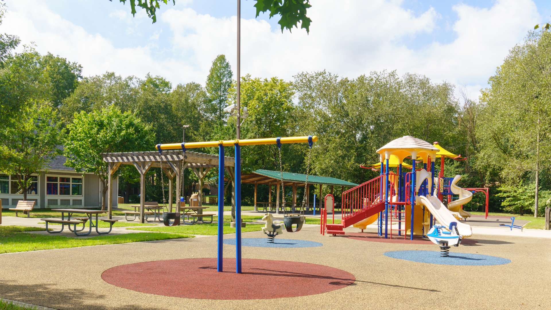 Playground with community center in background
