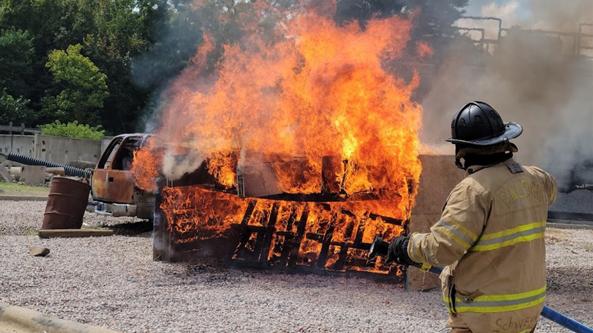 Raleigh firefighter looking at training fire