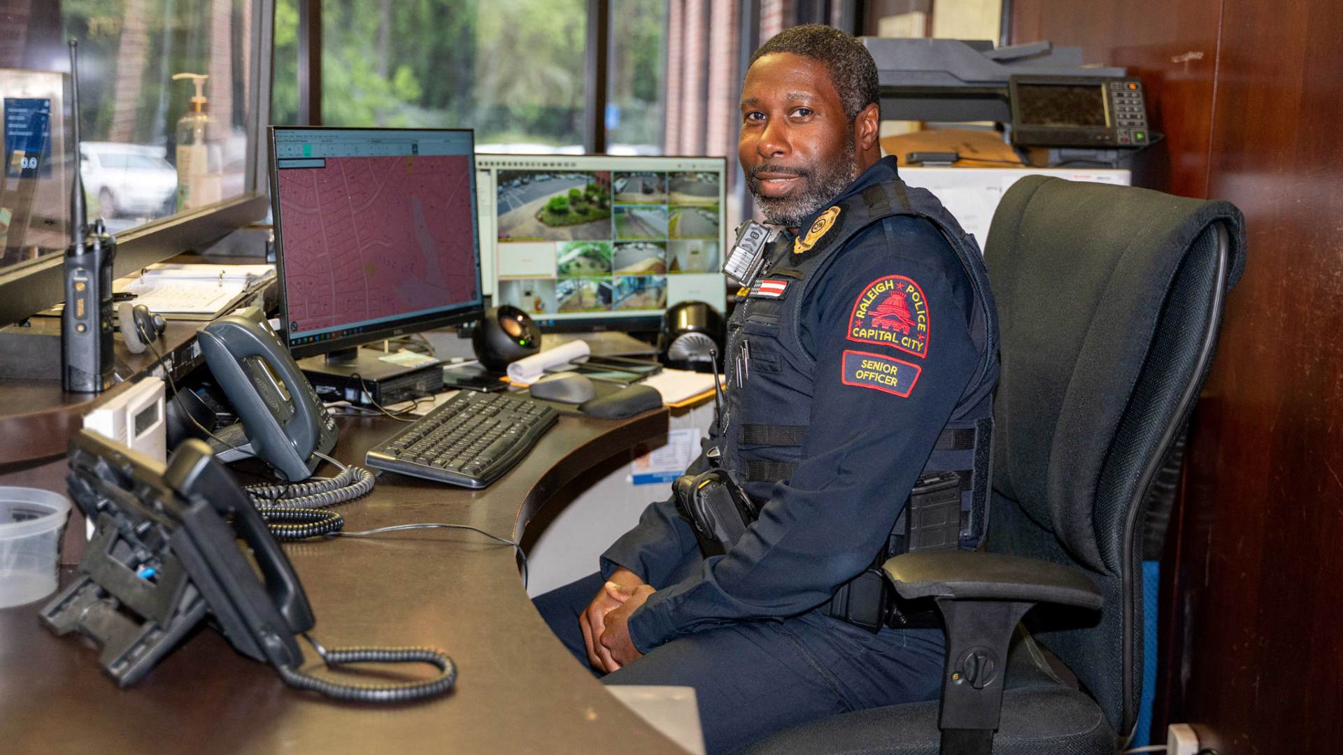 Raleigh Police Officer Sitting at Desk