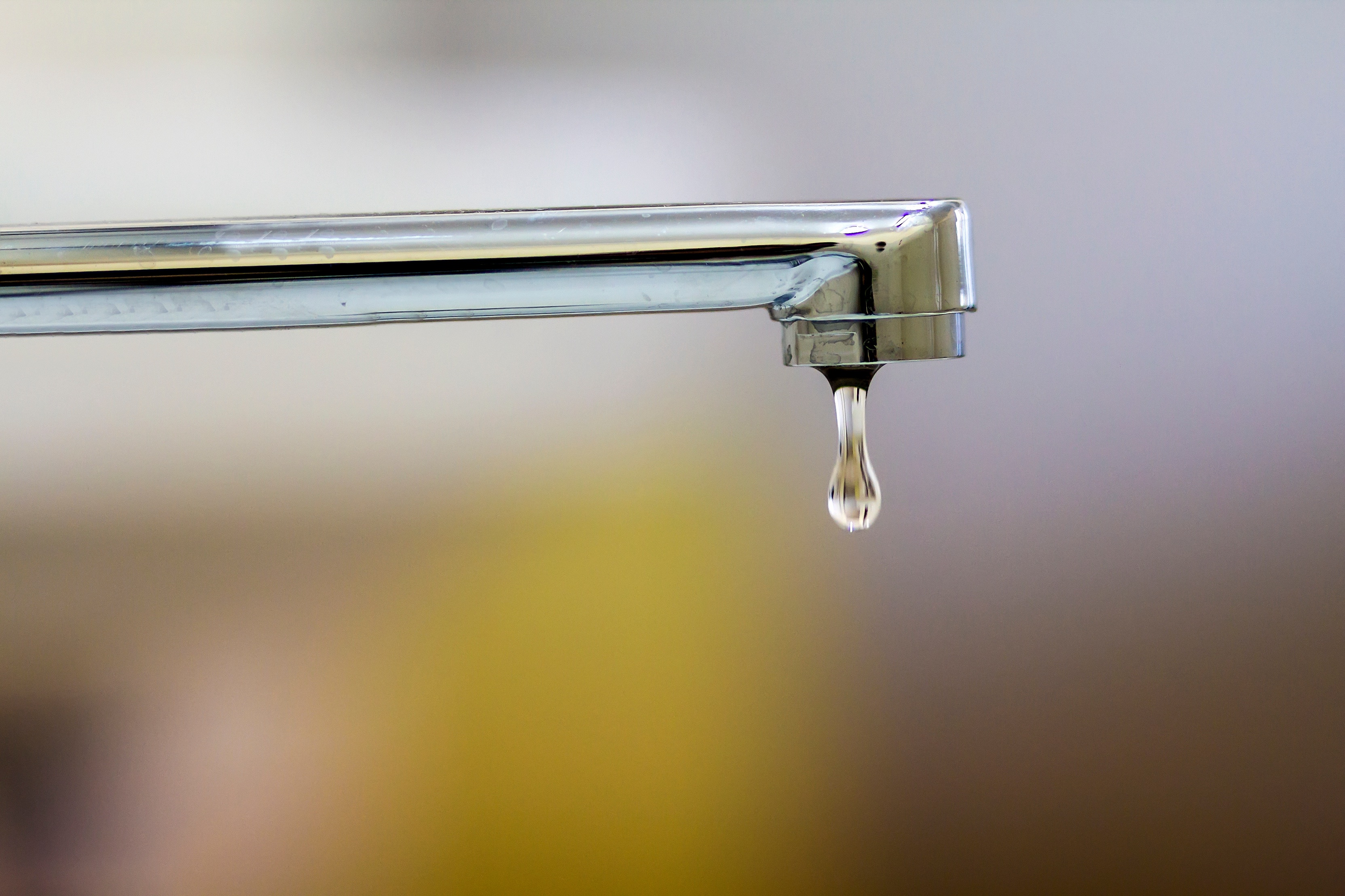 Close-up of faucet with turned drop water