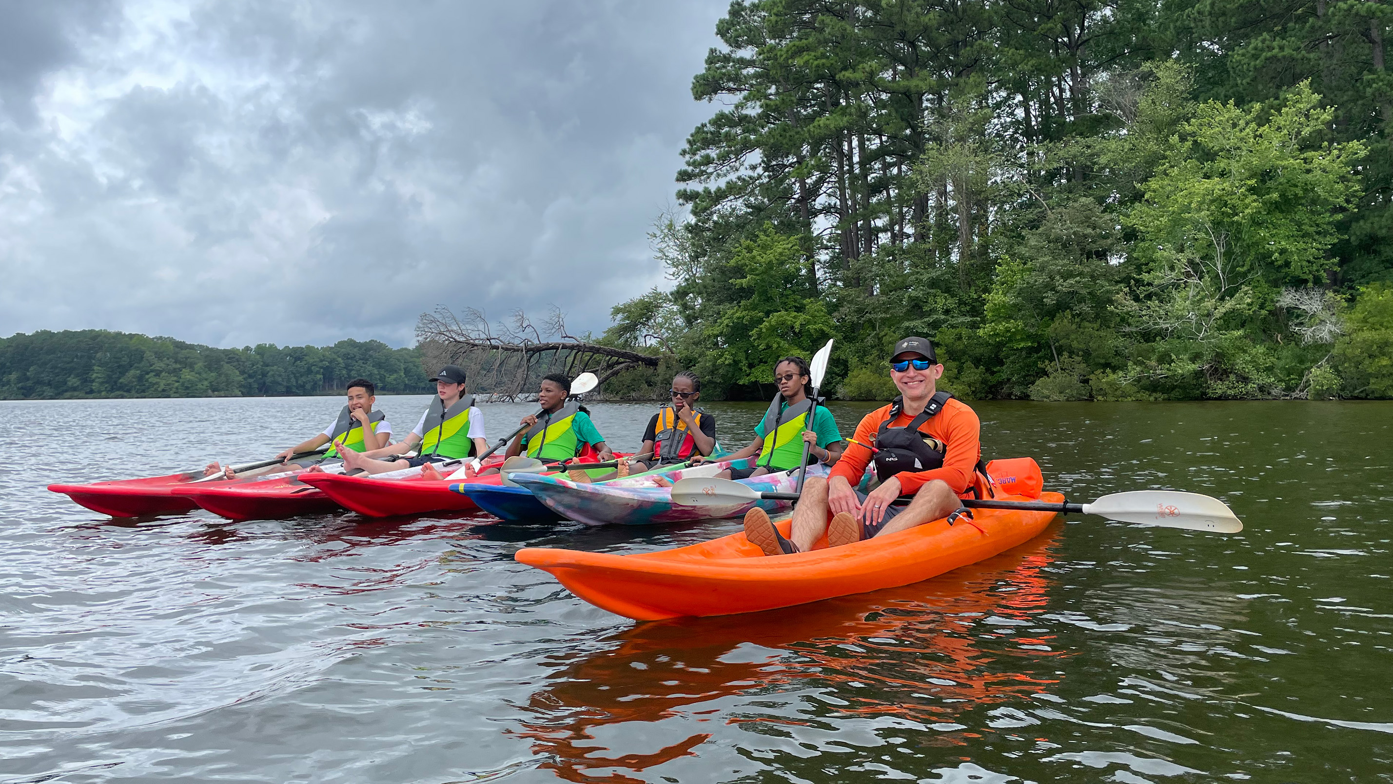 teen summer campers kayaking