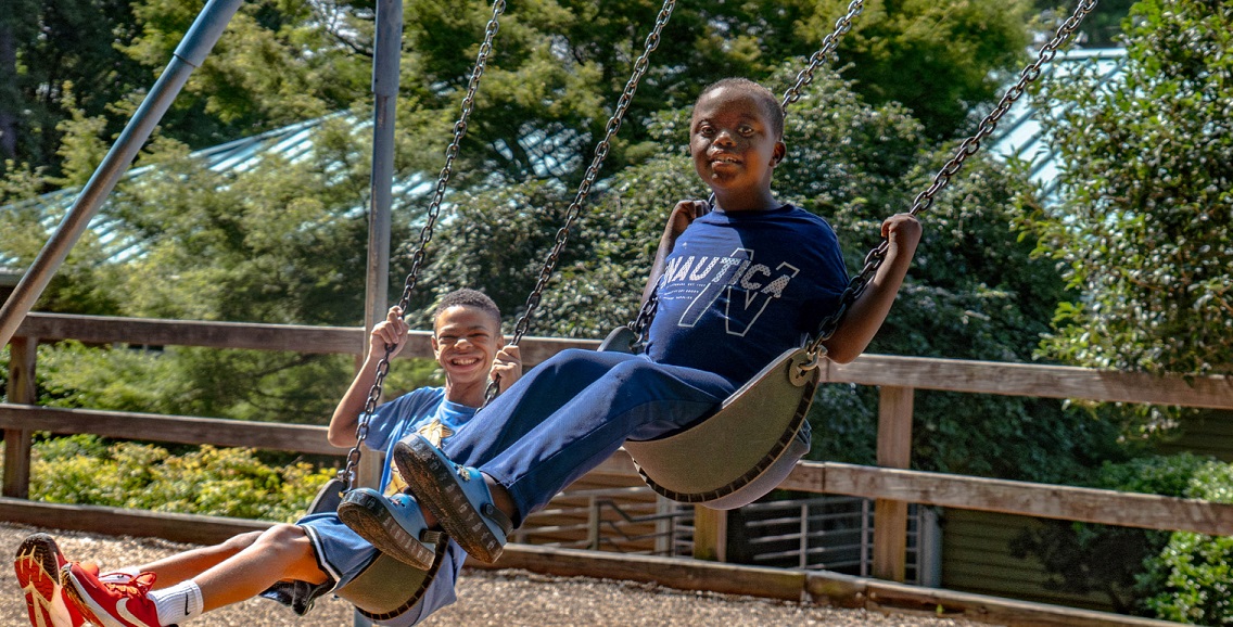 kids at a park swinging