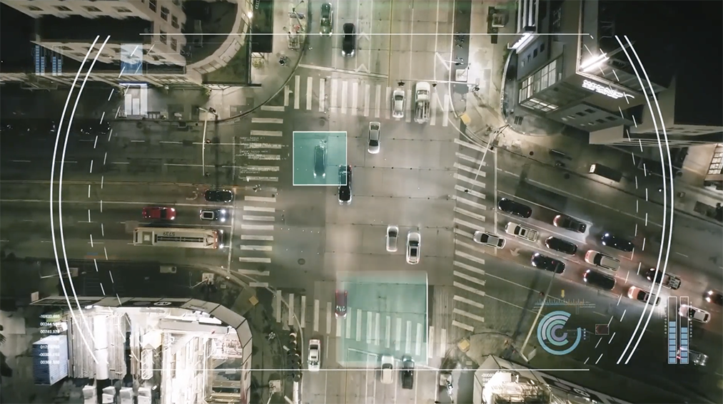 Sky view of traffic in city streets.