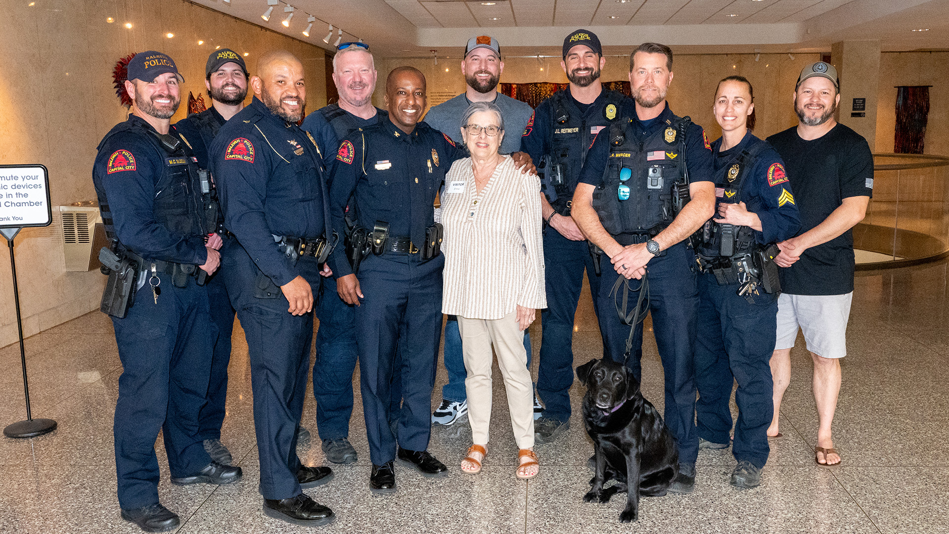 Chief Boyce and several members of the Raleigh Police Department were present for the gift announcement presented by Teresa Langley (pictured in the middle) during the City Council meeting.