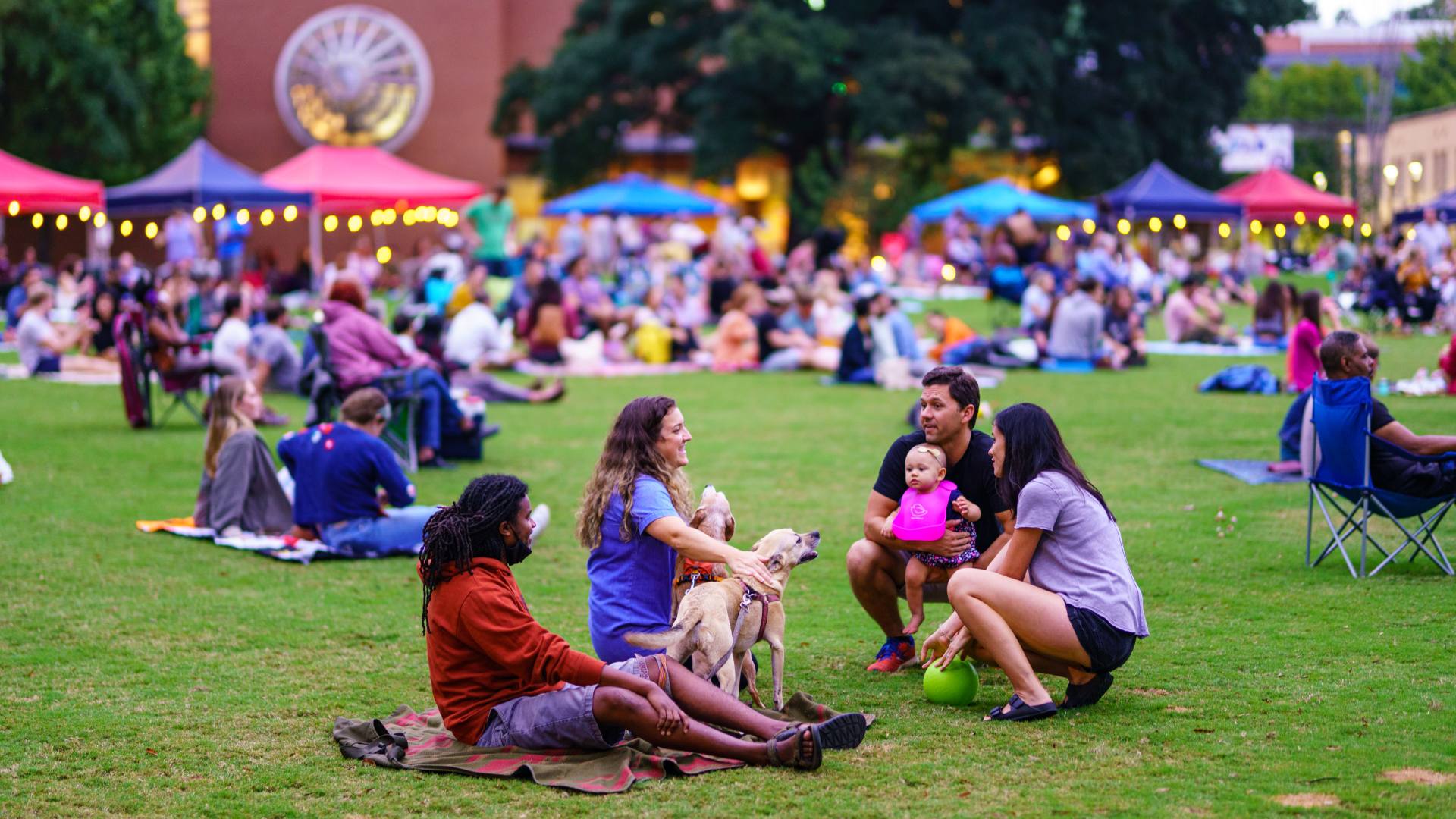 People enjoying a night in Moore Square