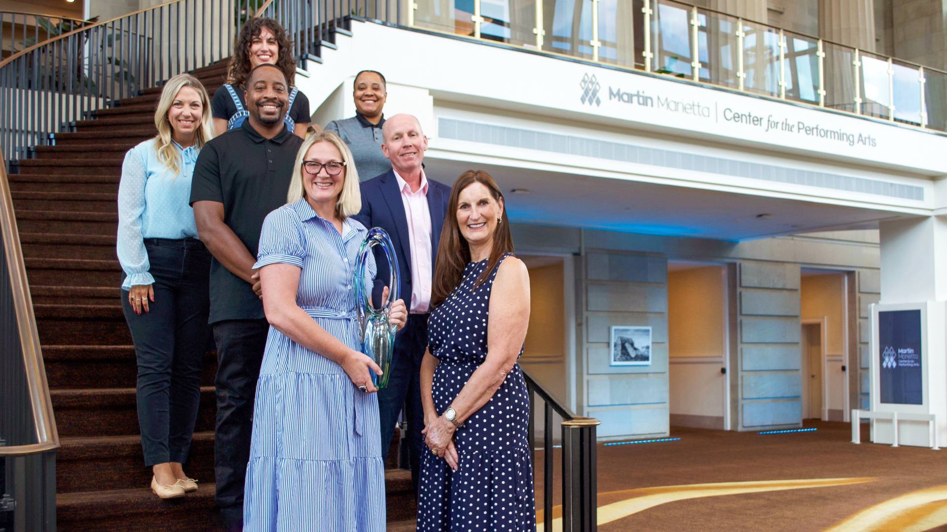 RCC staff accepts award
