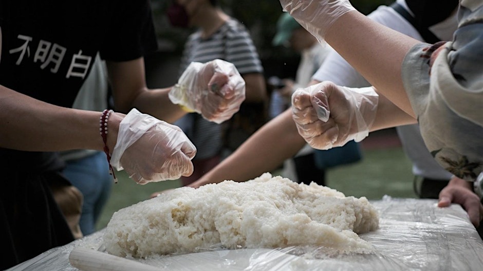 fists punching rice
