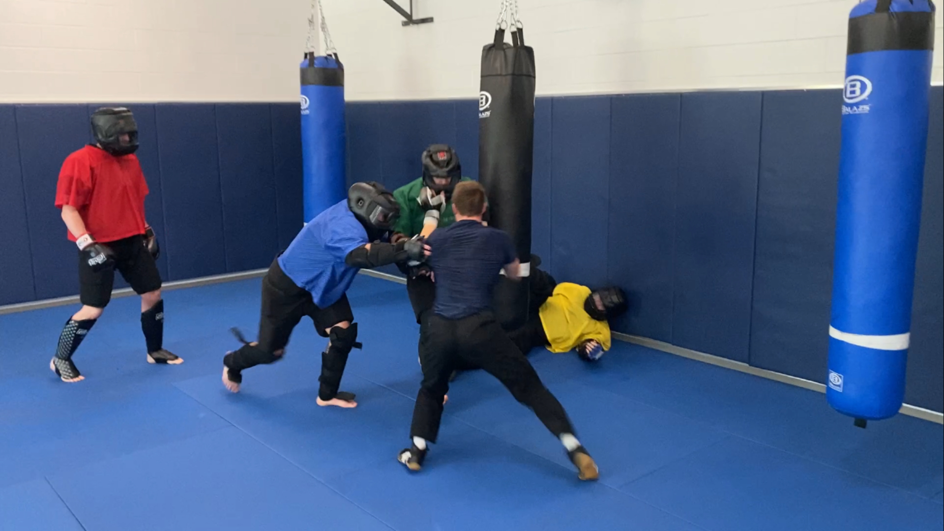 Officer Mills training sparring in a simulated attack scenario