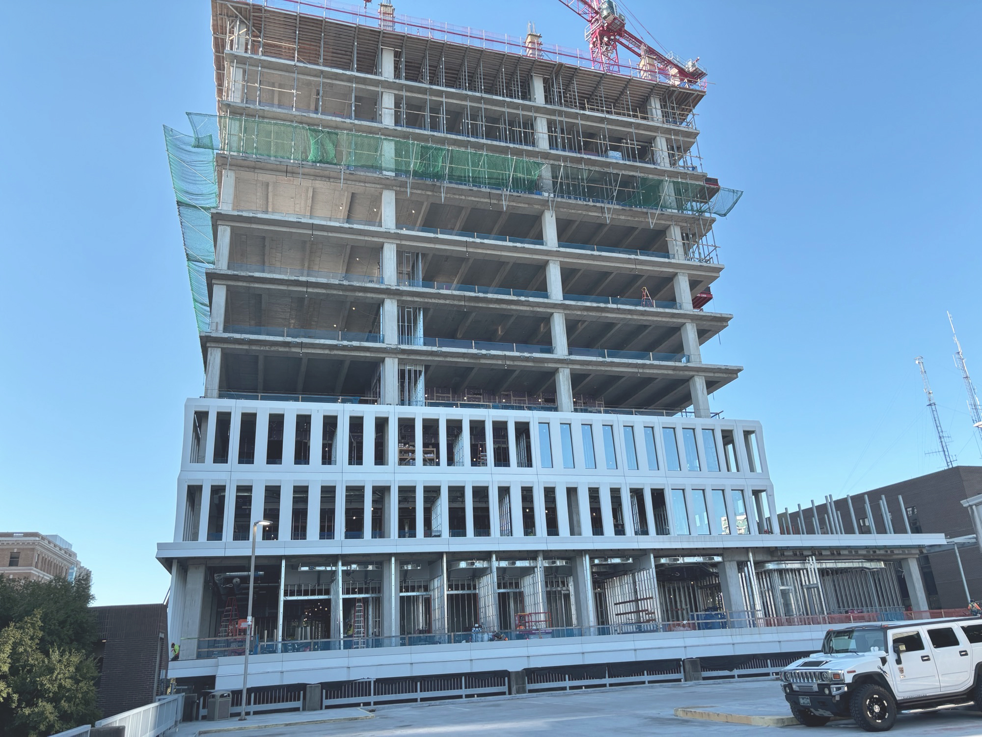 City Hall construction site from the parking deck on Morgan Street, this image shows the new glass going into the windows and the precast shell going up