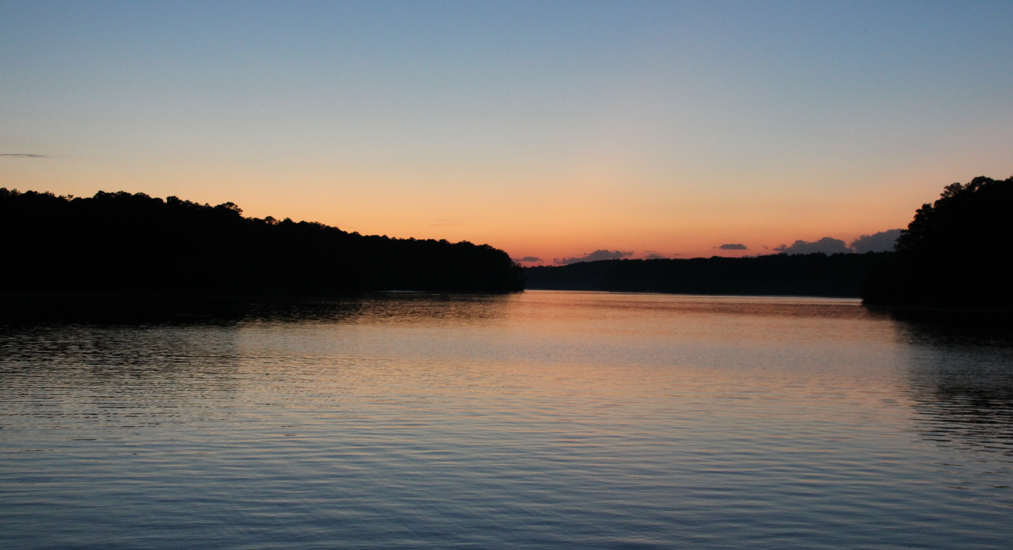 a lake with a sunset