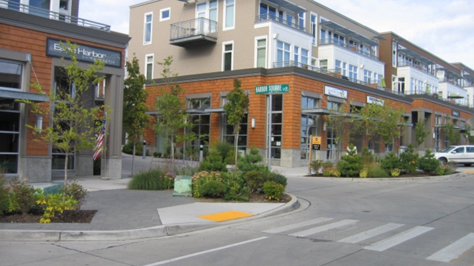A crosswalk with buildings in the background.