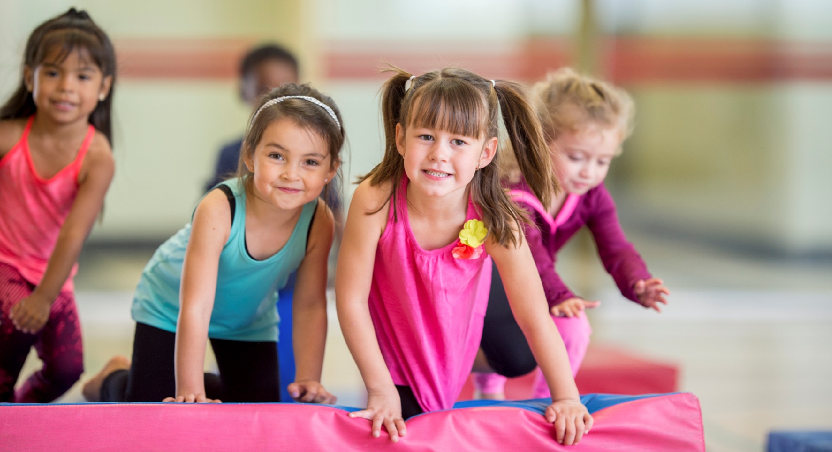 youth in a gymnastics class