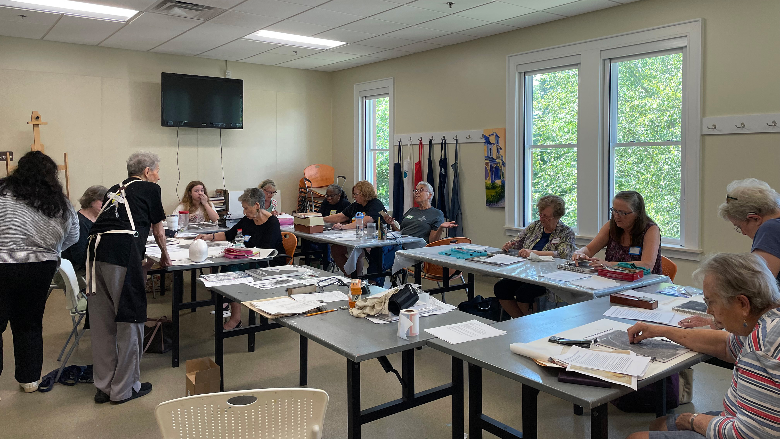 a class of people working on artful masterpieces 