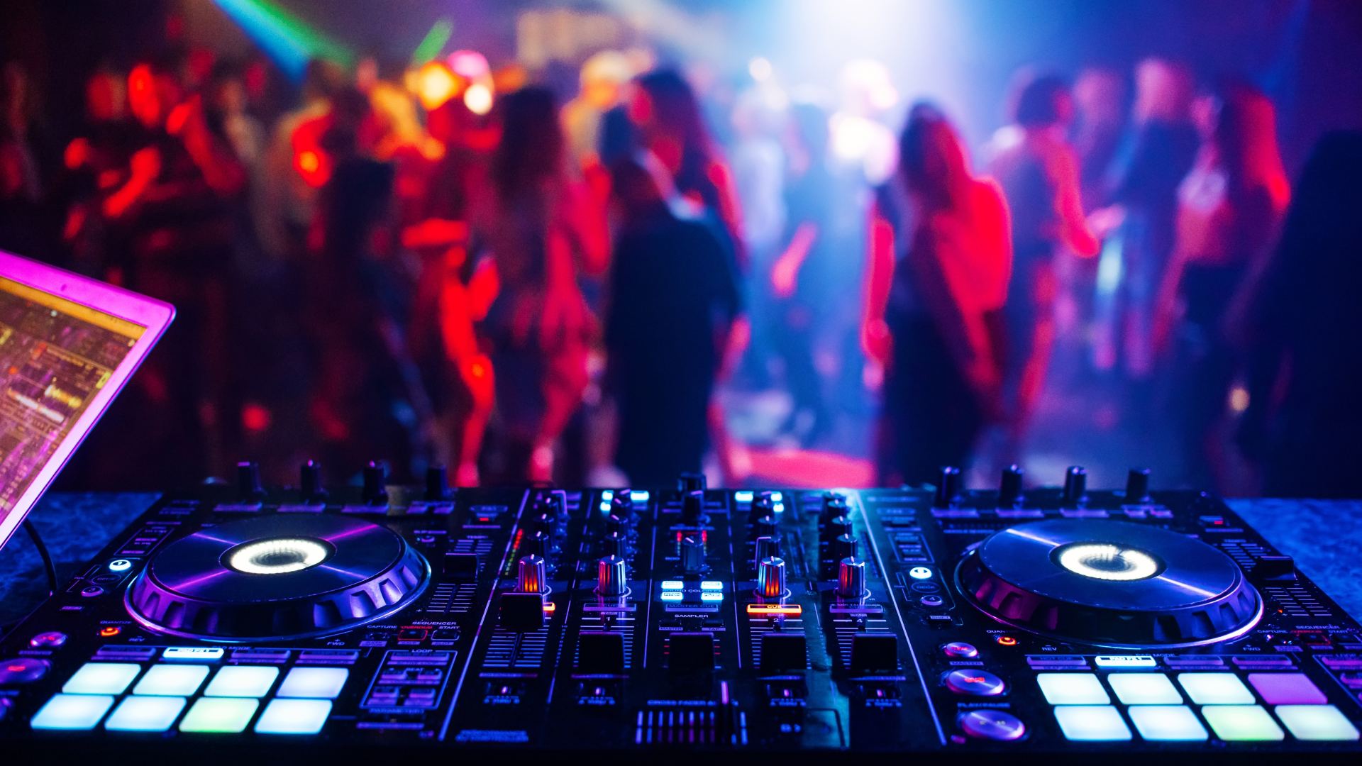 A DJ booth at a nightclub