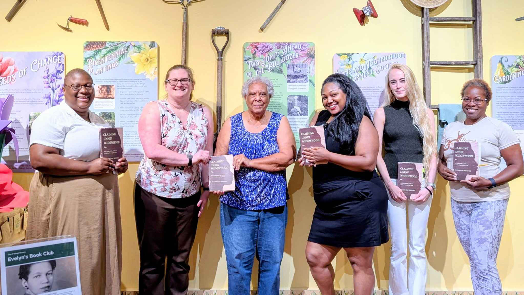 a group of people in Evelyn's Book Club