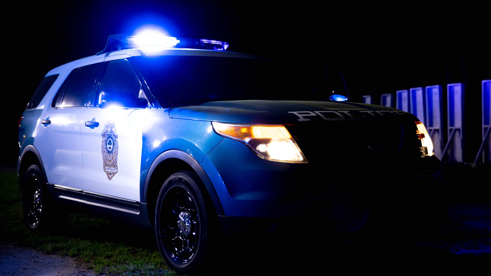 An RPD car at night with its lights on