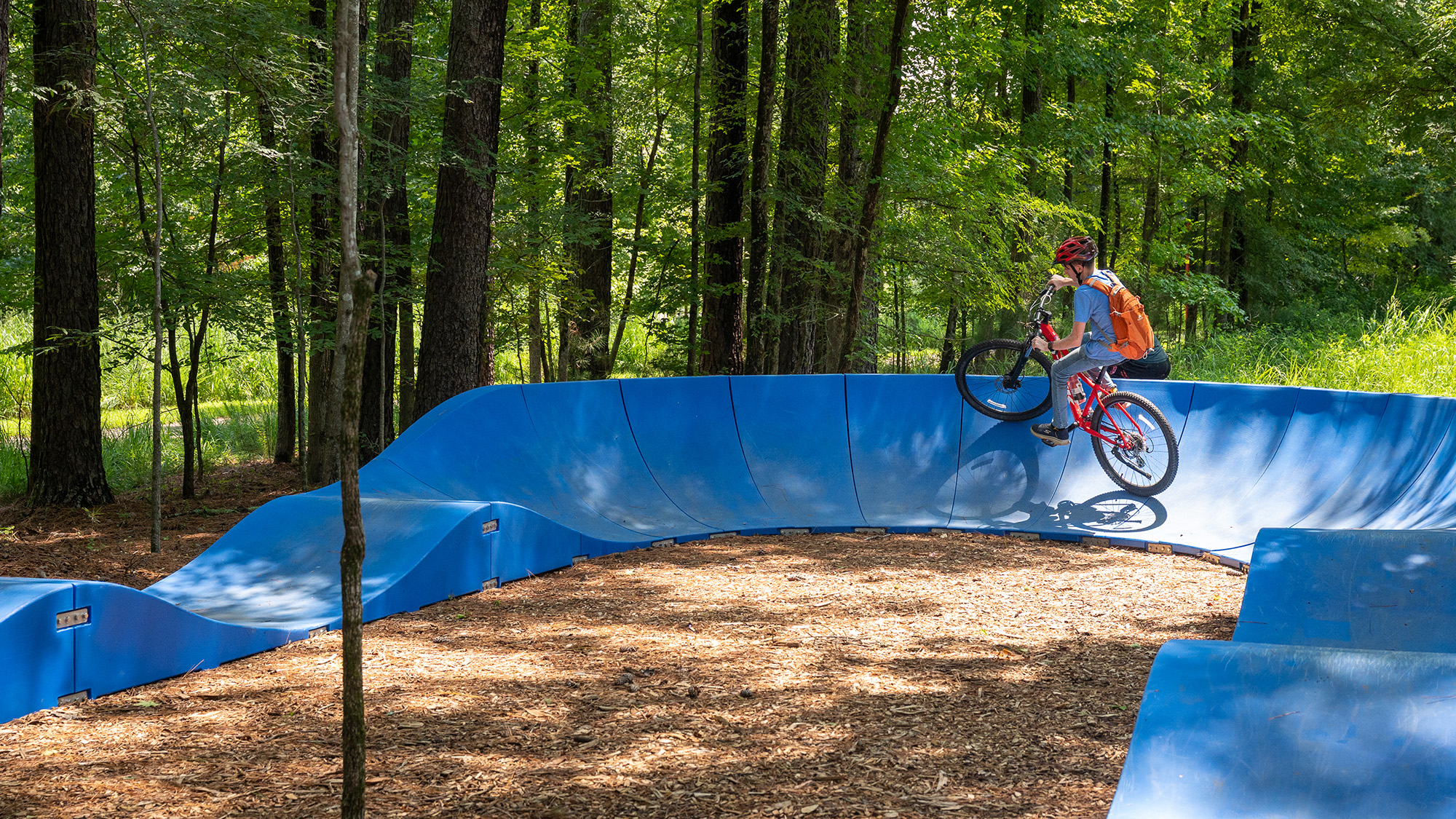 a person on a bike on the Pump Track