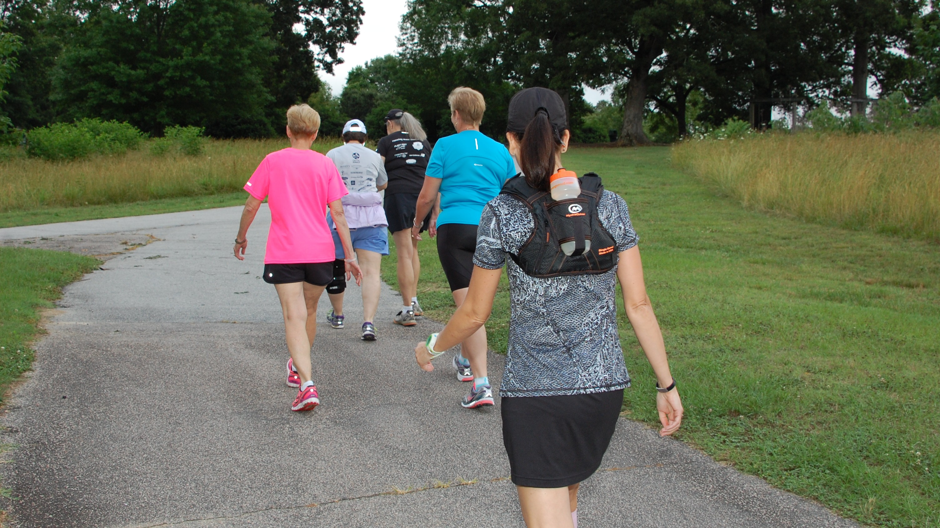 people walking on a trail
