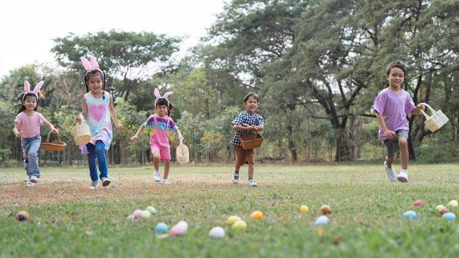 kids doing a hunt for eggs in a field