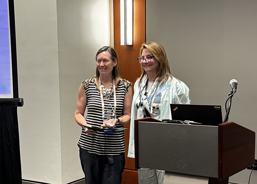 City IT employee Beth Stagner accepts the IDC award. 