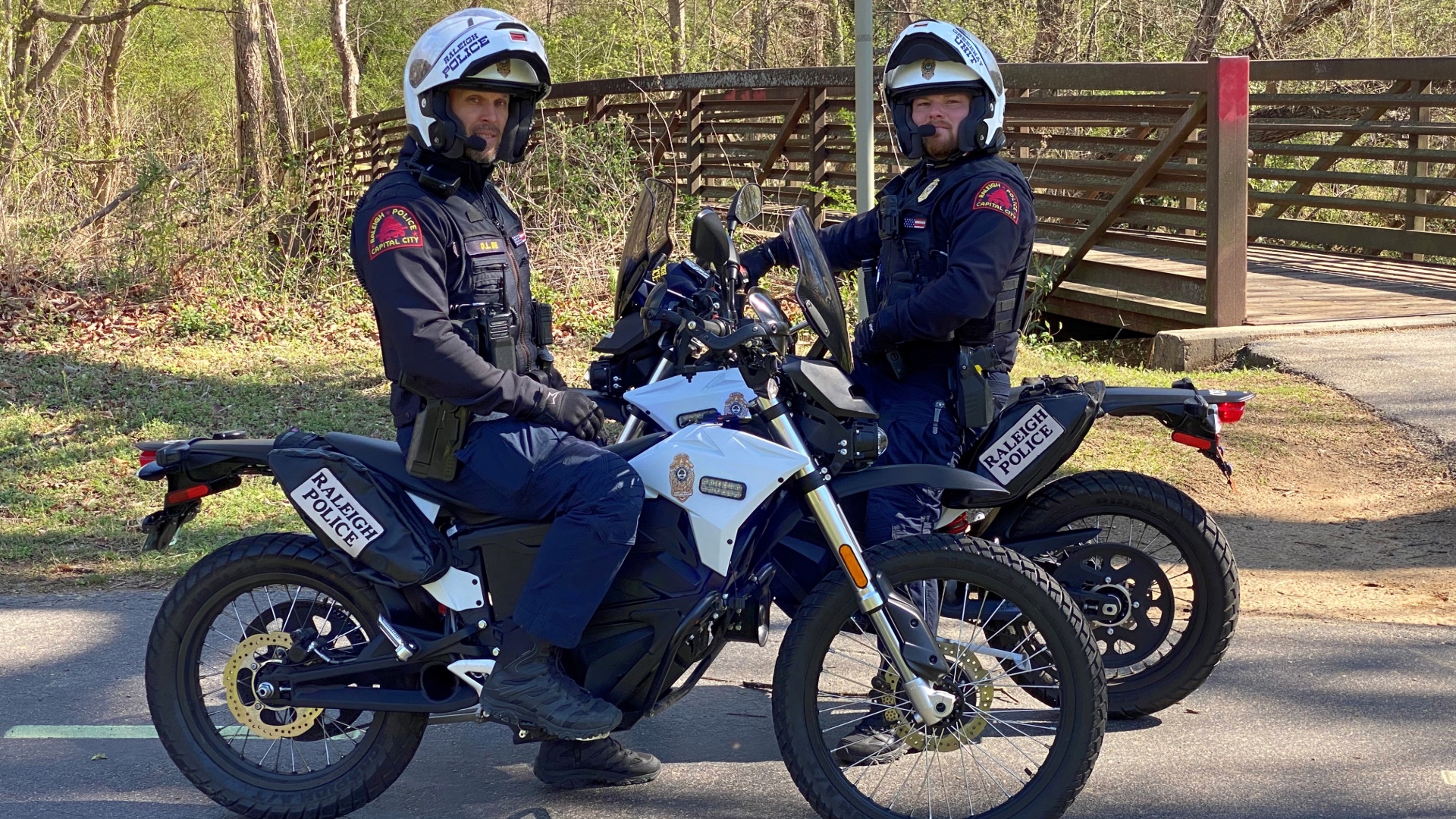 Two police officers on dirt bikes