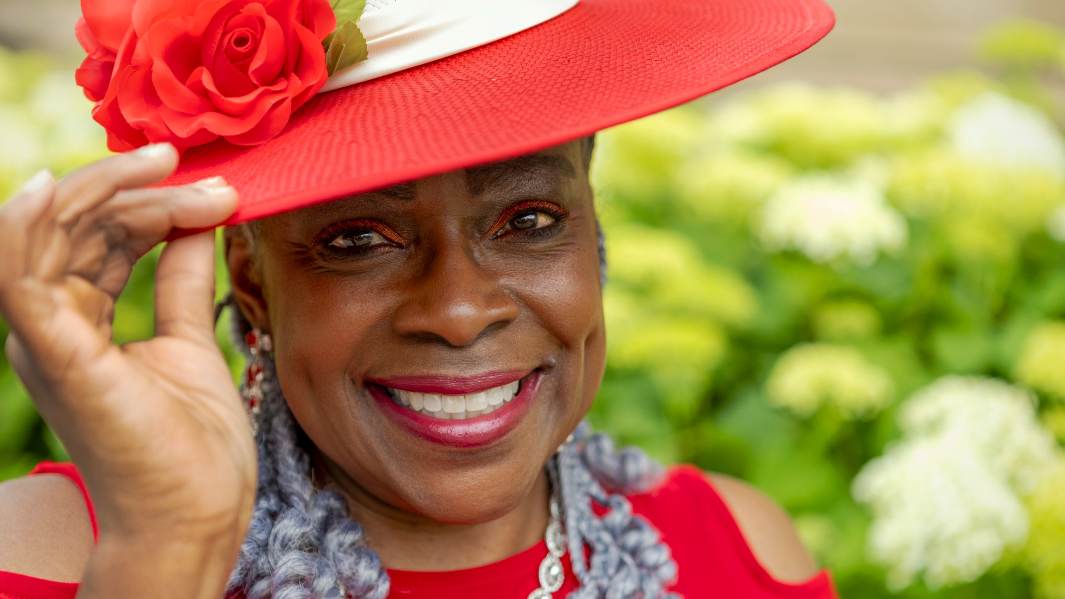 a woman with a red hat on