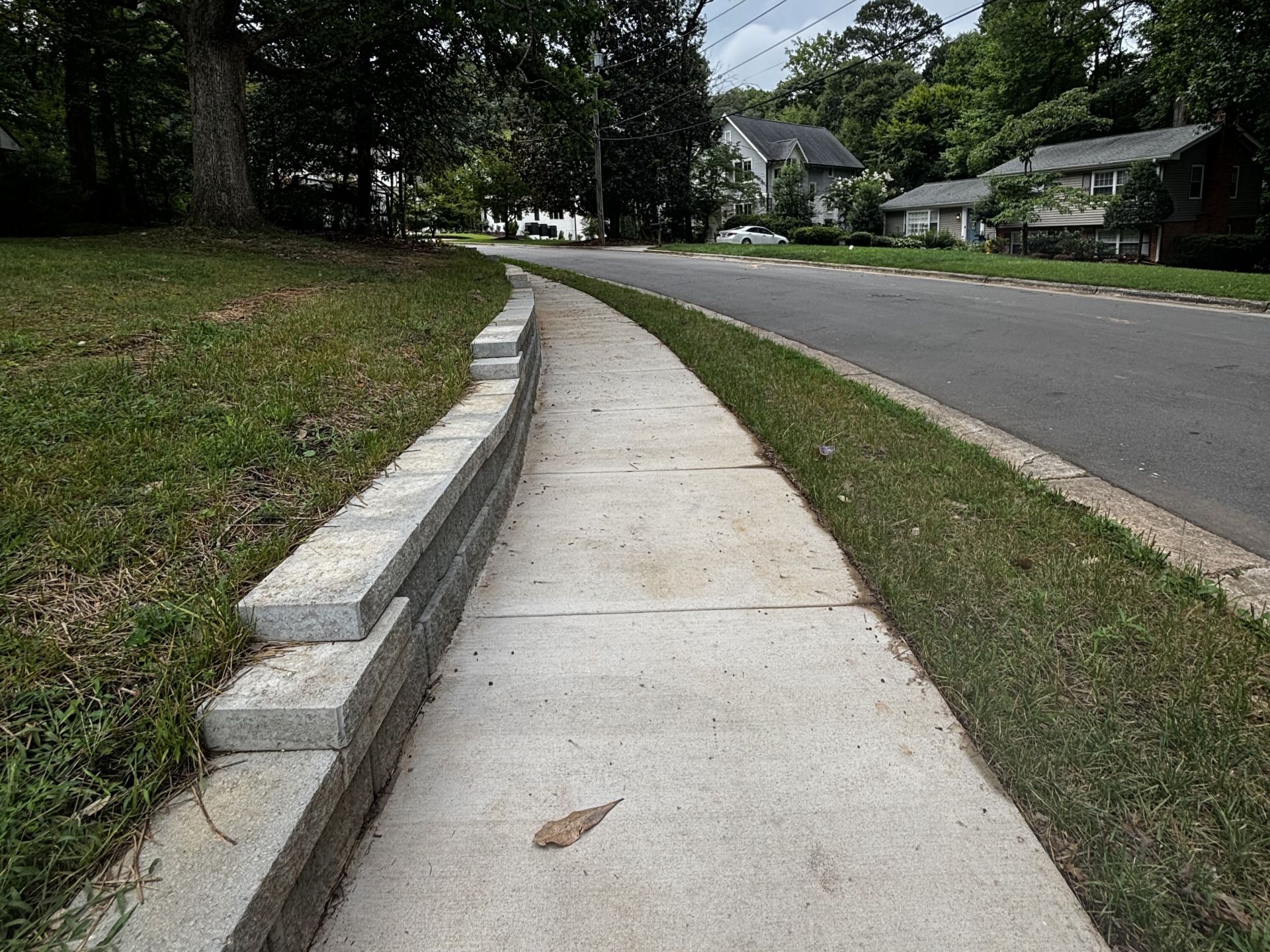 sidewalk with retaining wall