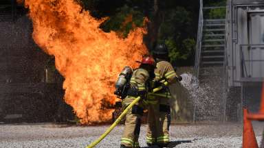 Firefighters putting out a fire