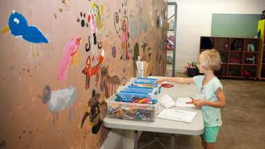girl crafting at arts center