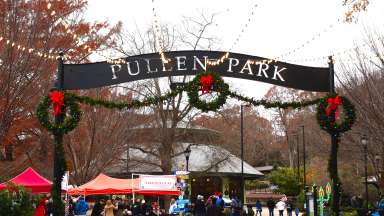 Pullen Park entry arch decorated for holidays.