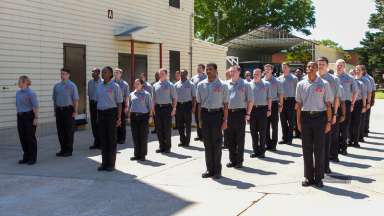 fire academy recruits standing at attention