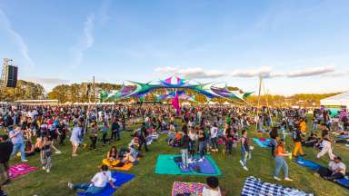Attendees gather at Dorothea Dix Park for Dreamville Festival