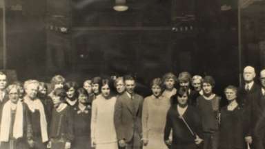 Photograph of the Boylan-Pearce possibly staff in front of Boylan-Pearce building during the 1920s