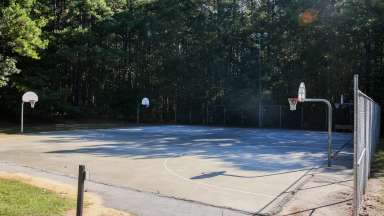 Two outdoor basketball courts at Sanderford Road Park 