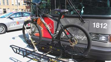 Bus with a bike loaded on the front rack