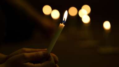 candle being held during a vigil