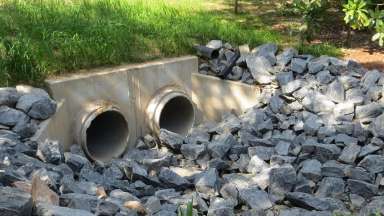 Two stormwater pipes at a property on Spring Drive