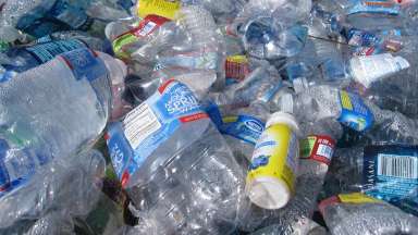 large pile of plastic bottles for recycling
