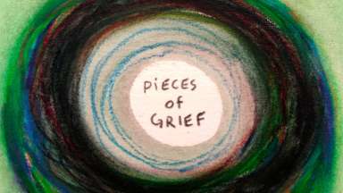 A drawing of multiple circles, with the words Pieces of Grief in the middle