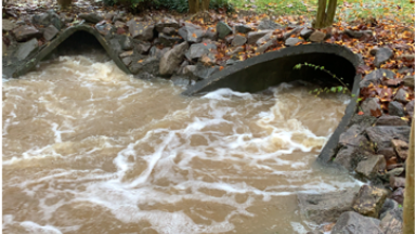 Water flowing through the current stormwater pipe in the W. North Ridge community