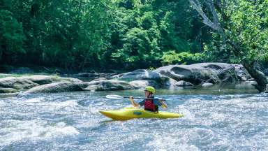 Person in kayak on river