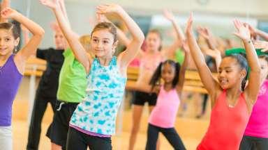 Boys and girls in contemporary dance class
