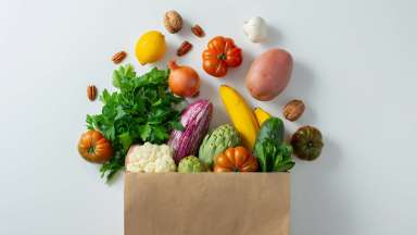 Grocery bag with fresh fruits and vegetables