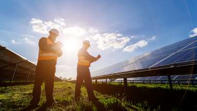 Inspections of solar panel farm by two people