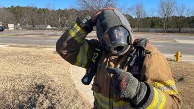 Firefighter wears new hood